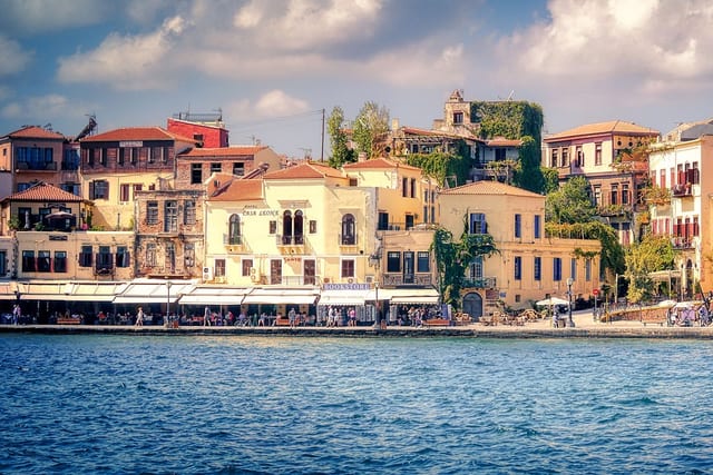 Painted houses along the Venetian harbour front at Chania.