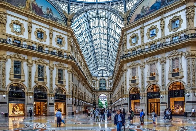 The Galleria Vittorio Emanuele II in Milan, glass vault overhead and mosaic floor below.